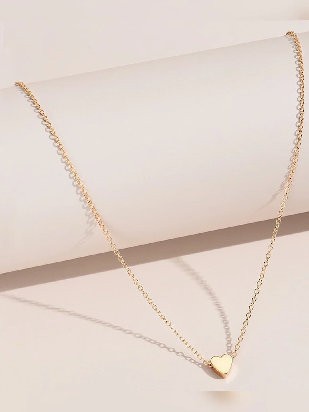 Gold heart-shaped pendant