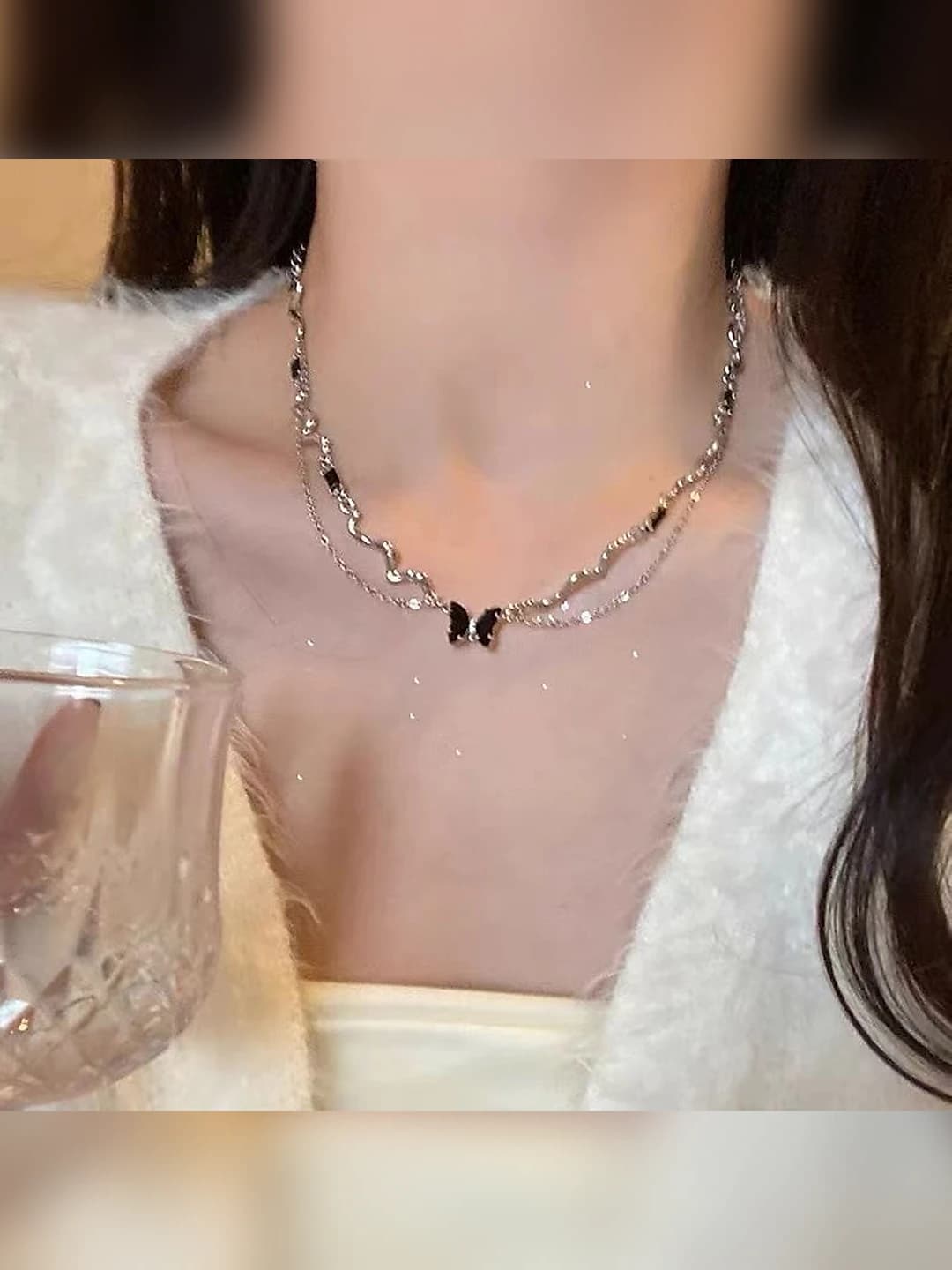 Black butterfly necklace