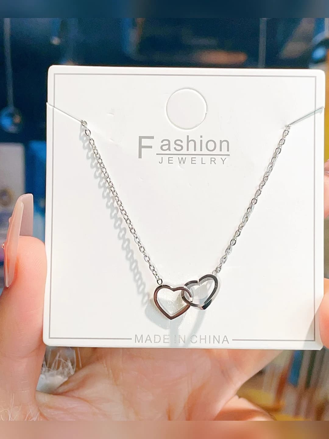 Titanium double ring heart