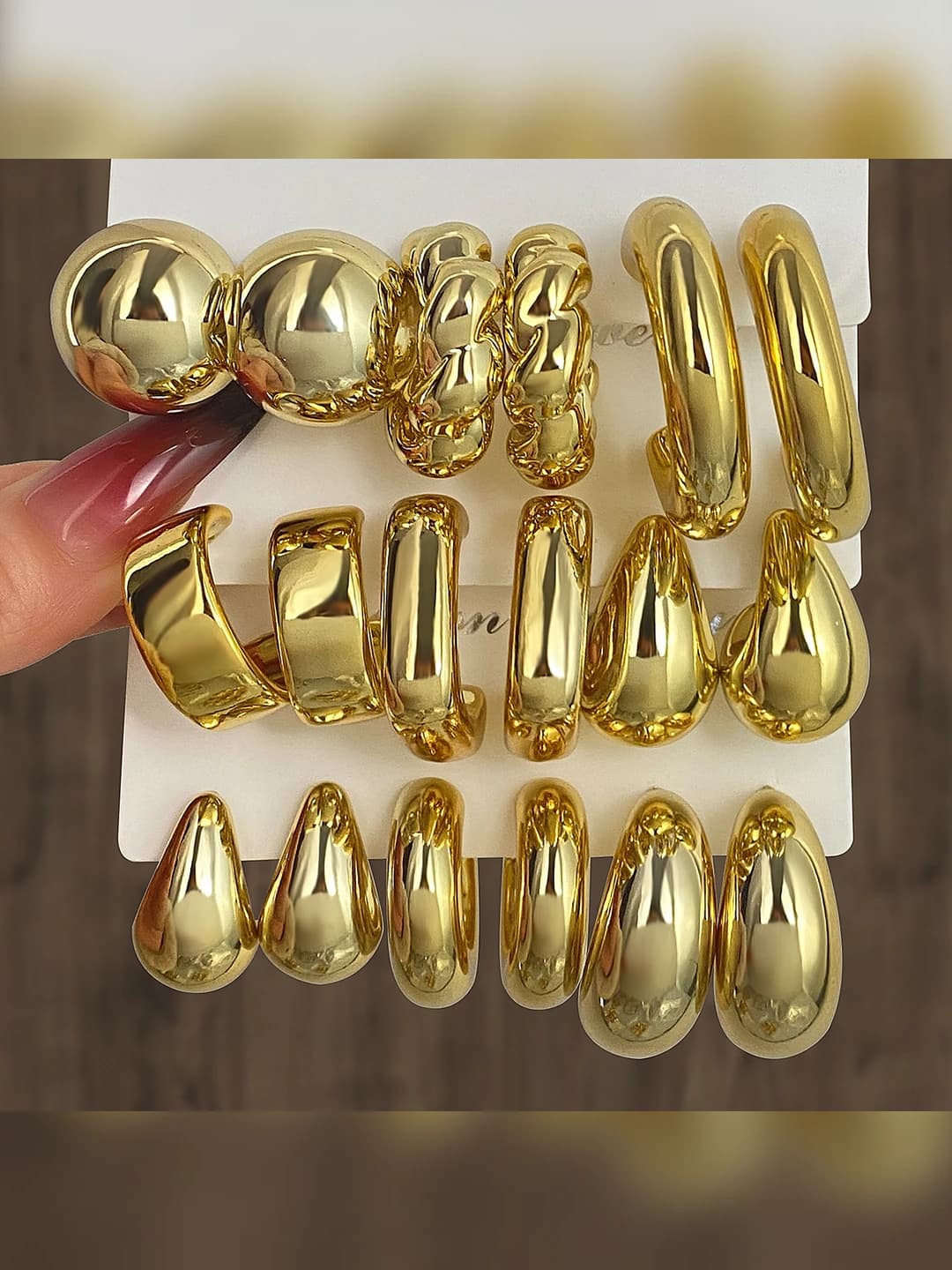 Women's retro set of large C-shaped hoop earrings, gold and silver color, with geometric design element