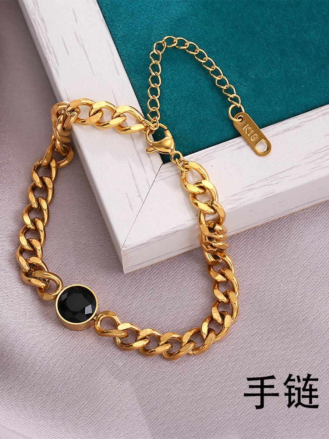 Women's short titanium steel bracelet with thick chain and round pendant