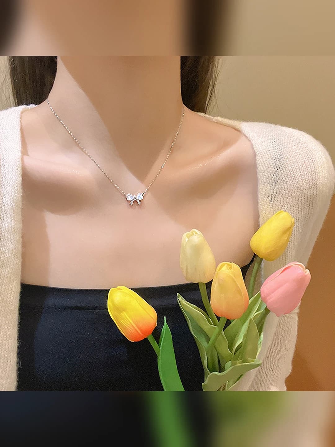 Cat's eye bow necklace
