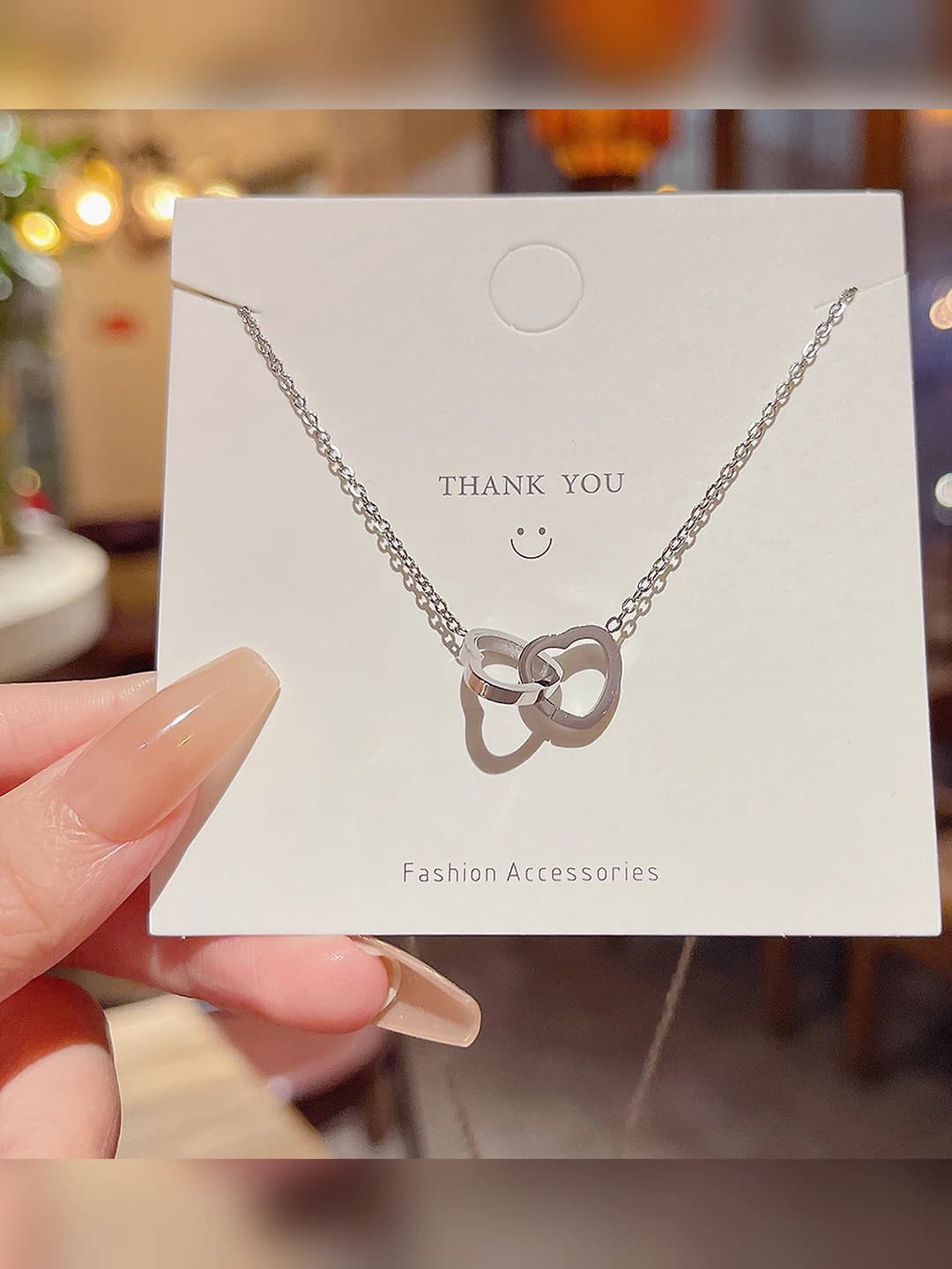 Titanium double ring heart