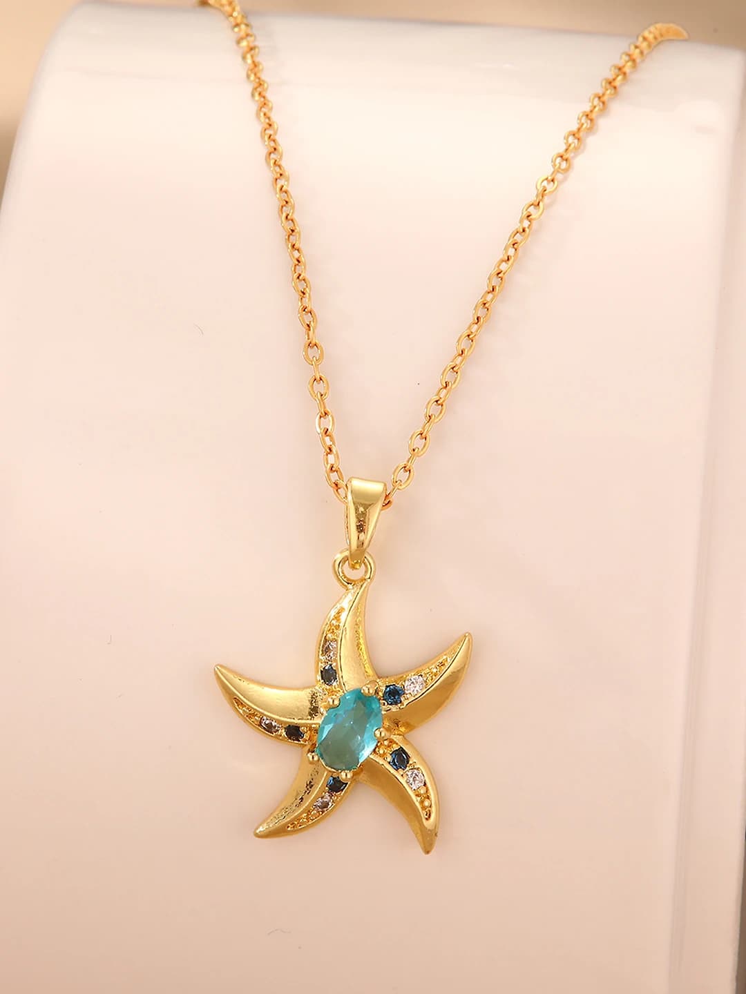 Blue diamond star necklace