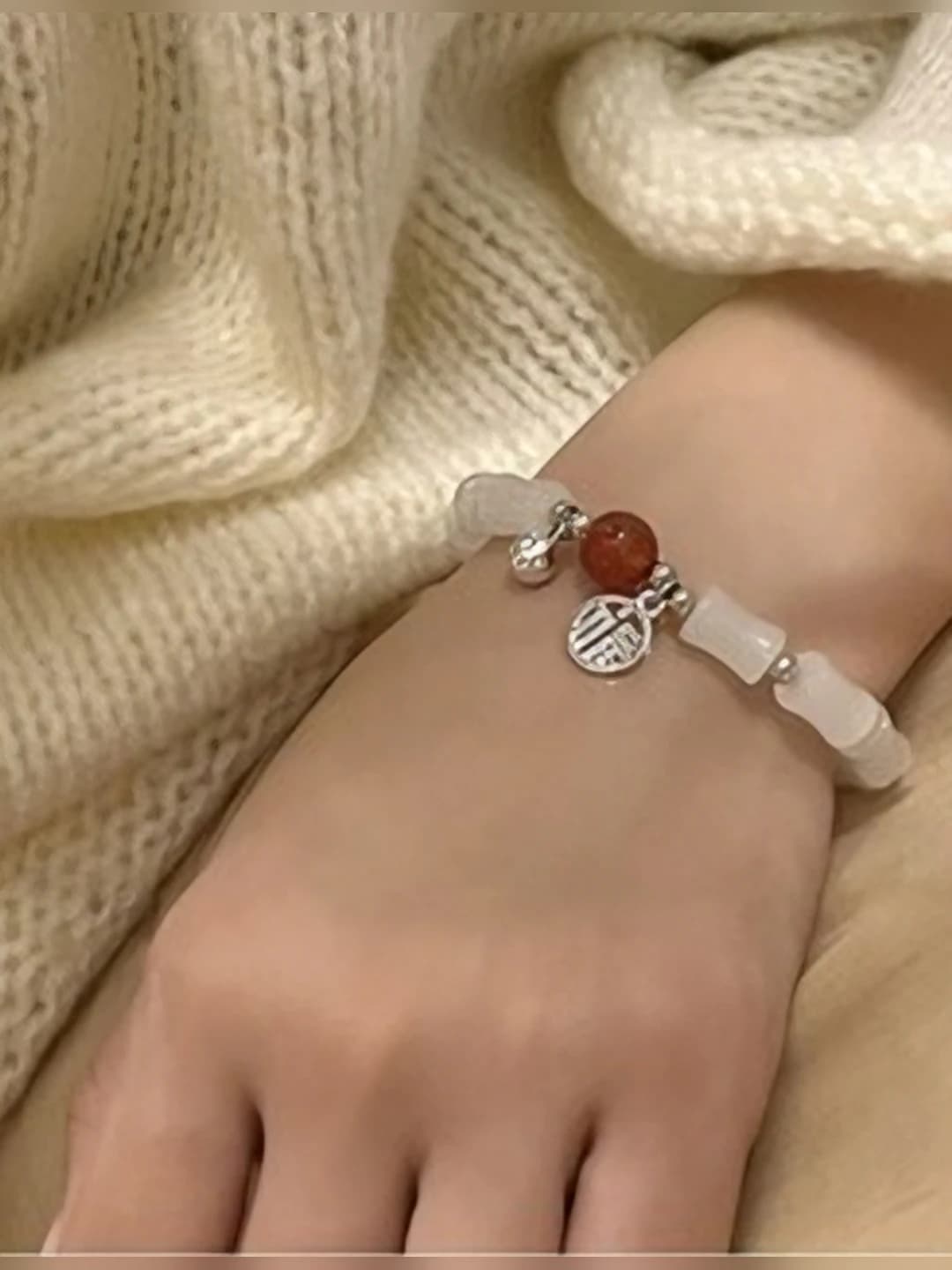 White bamboo fu red bead bracelet