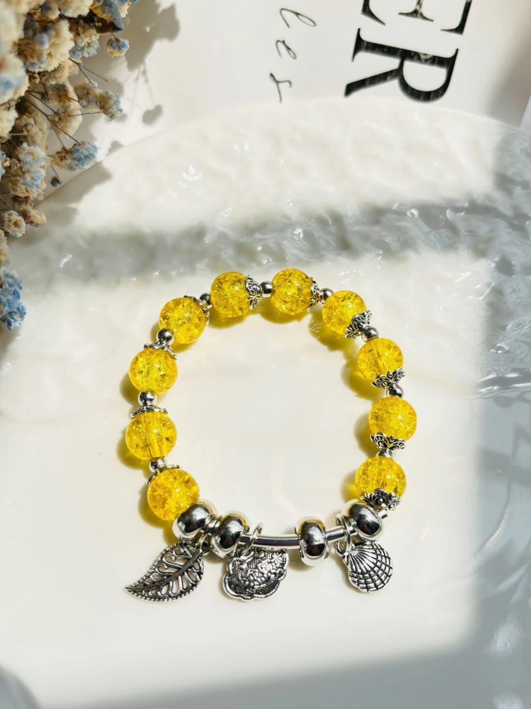 Yellow shell leaf beads
