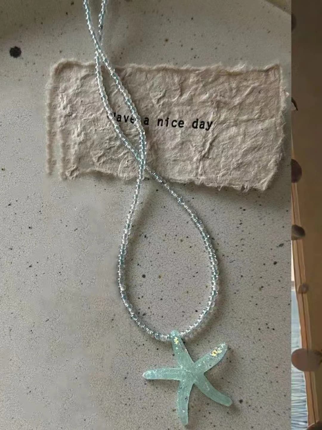 Blue starfish necklace