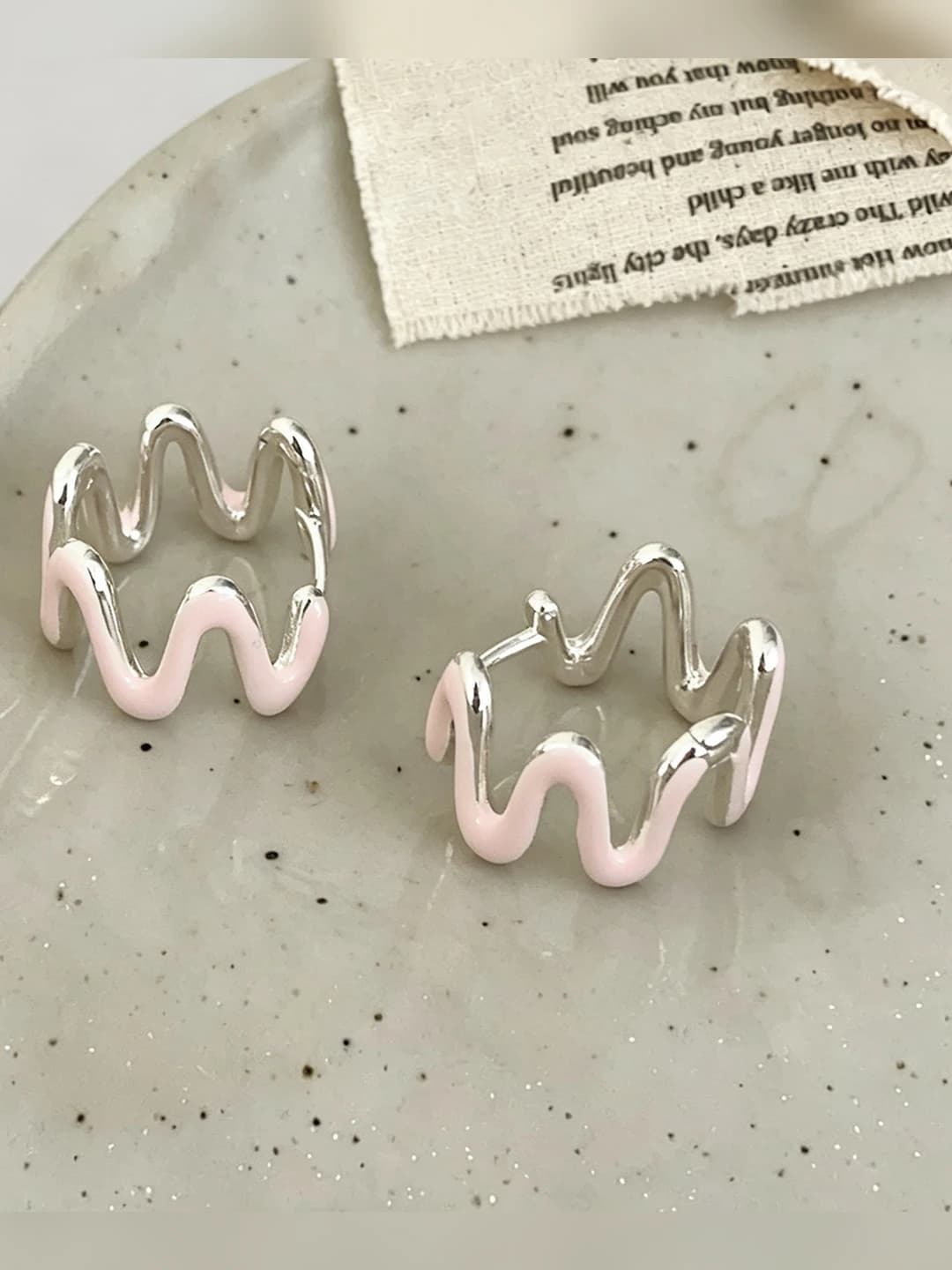 Pink enamel, twisted