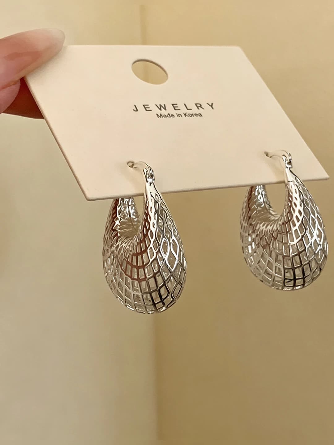 Silver, cutout teardrop