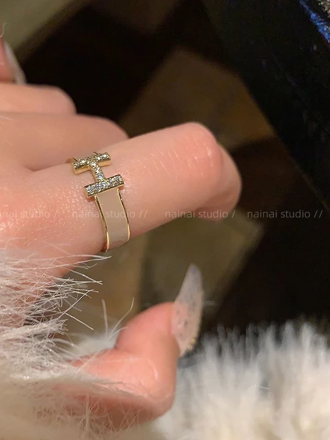 Khaki H letter ring