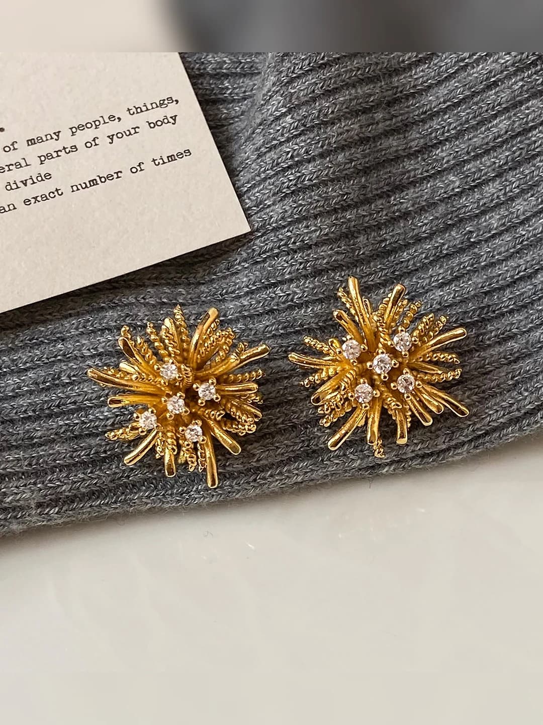 Gold stud earrings