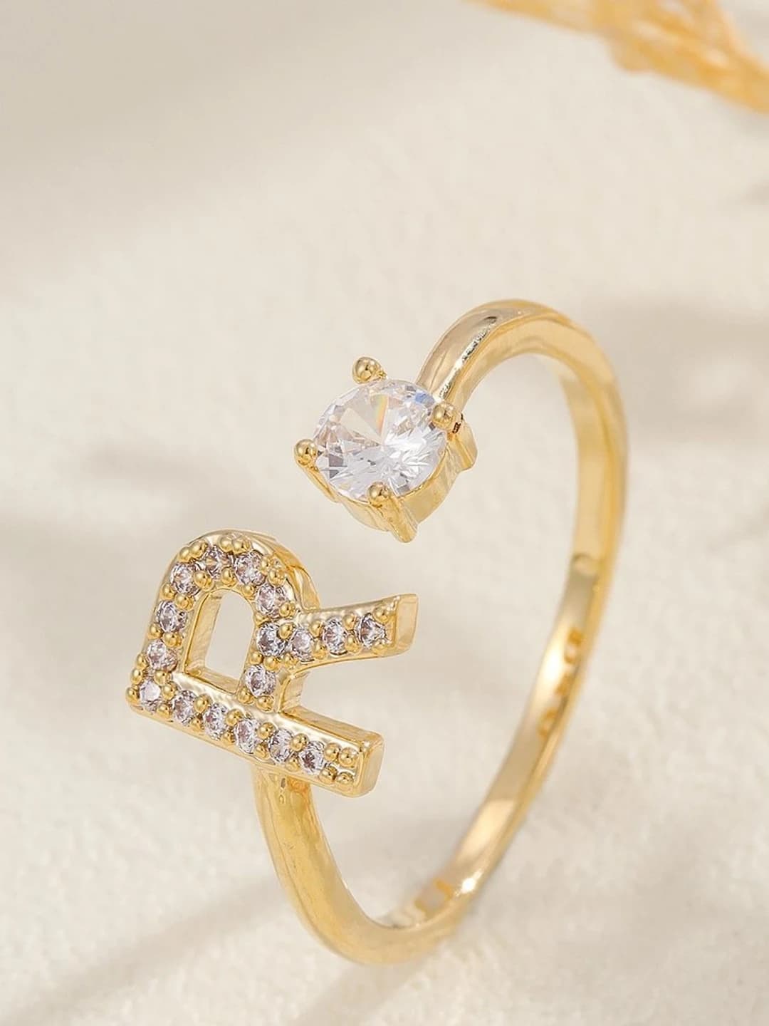 Gold letter R