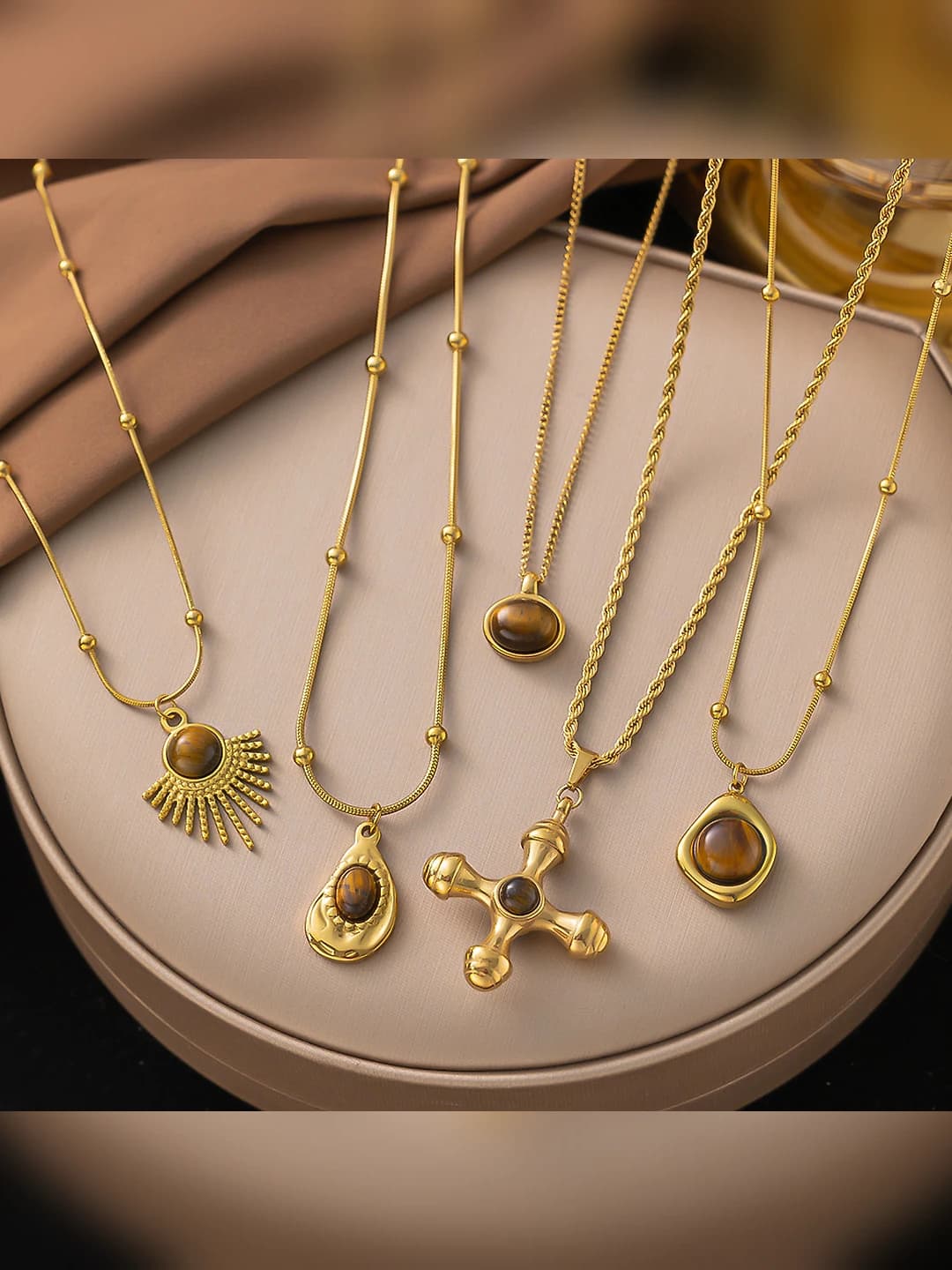 Women's titanium steel autumn-winter sweater chain, geometric pendant with tiger eye inlay
