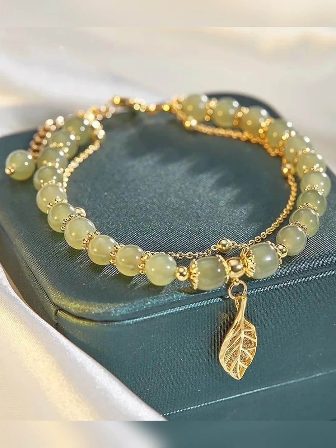 Gold branch and leaf bracelet