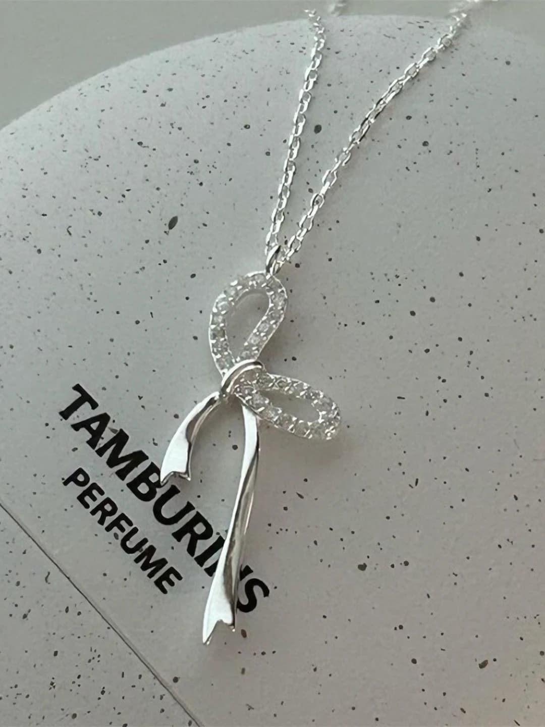 Women's 925 silver necklace with crystals in bow shape