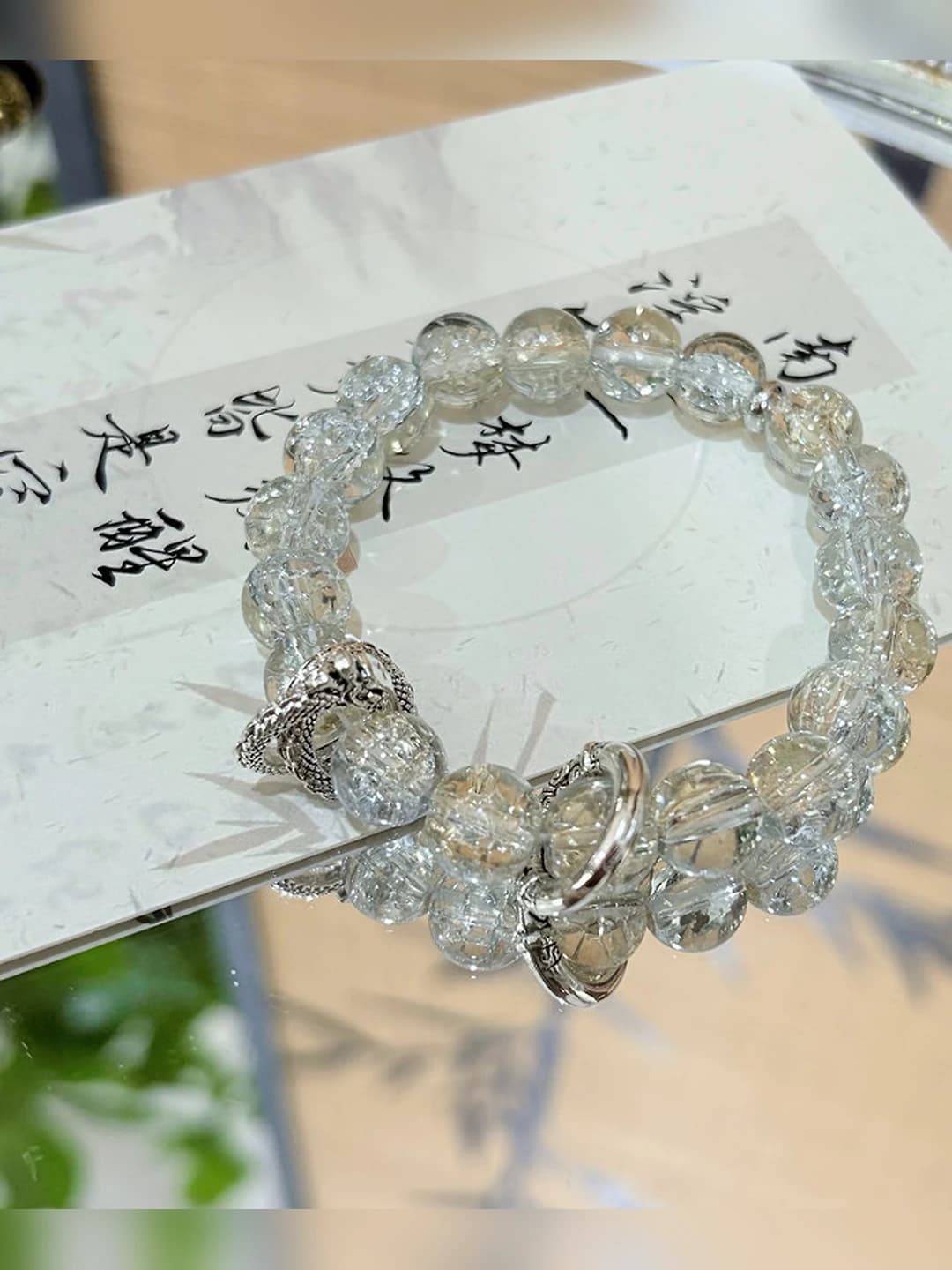 Burilgan ajdoh bilaguzuk, Qingqiu varianti