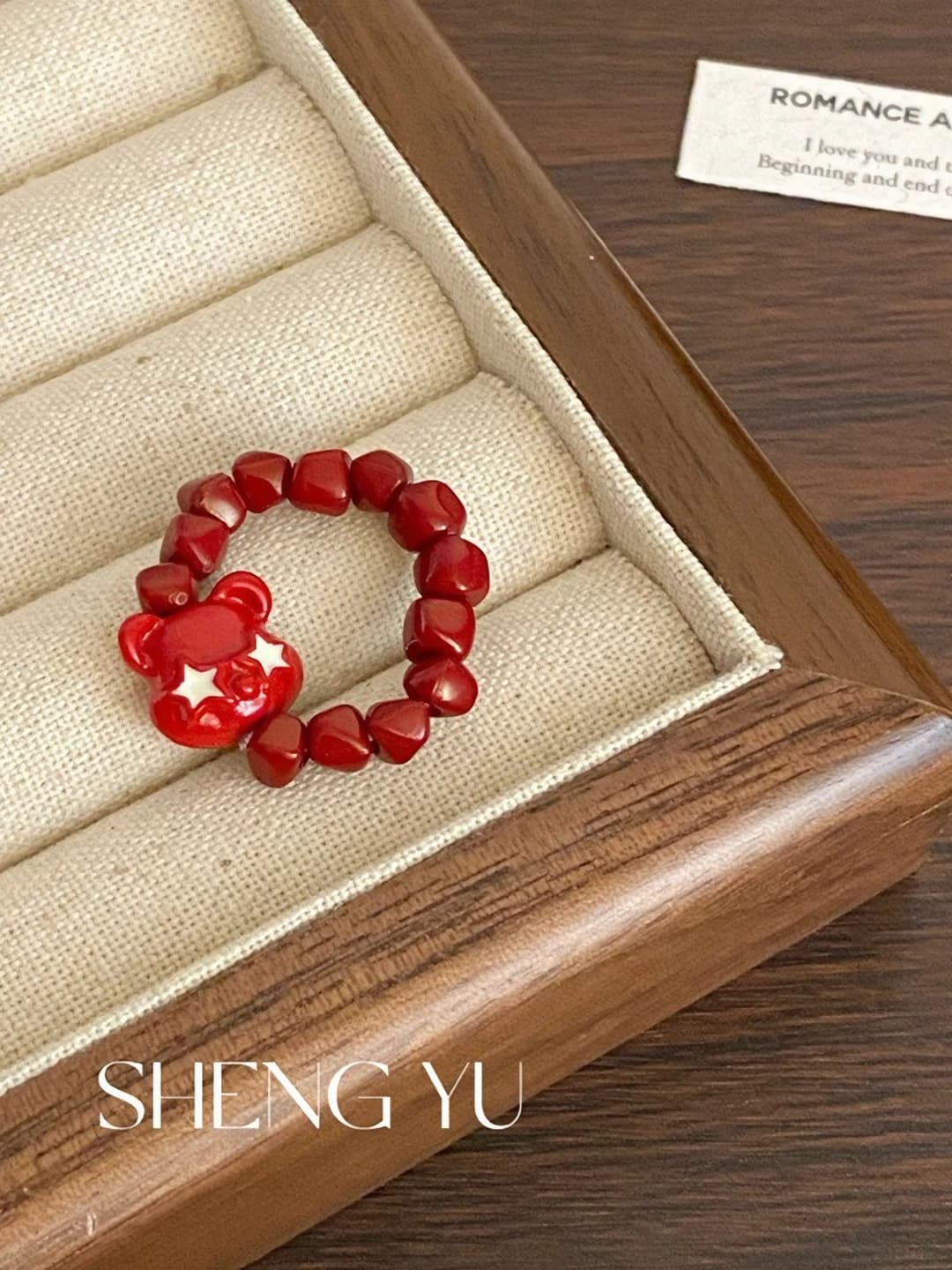 Red figure ring