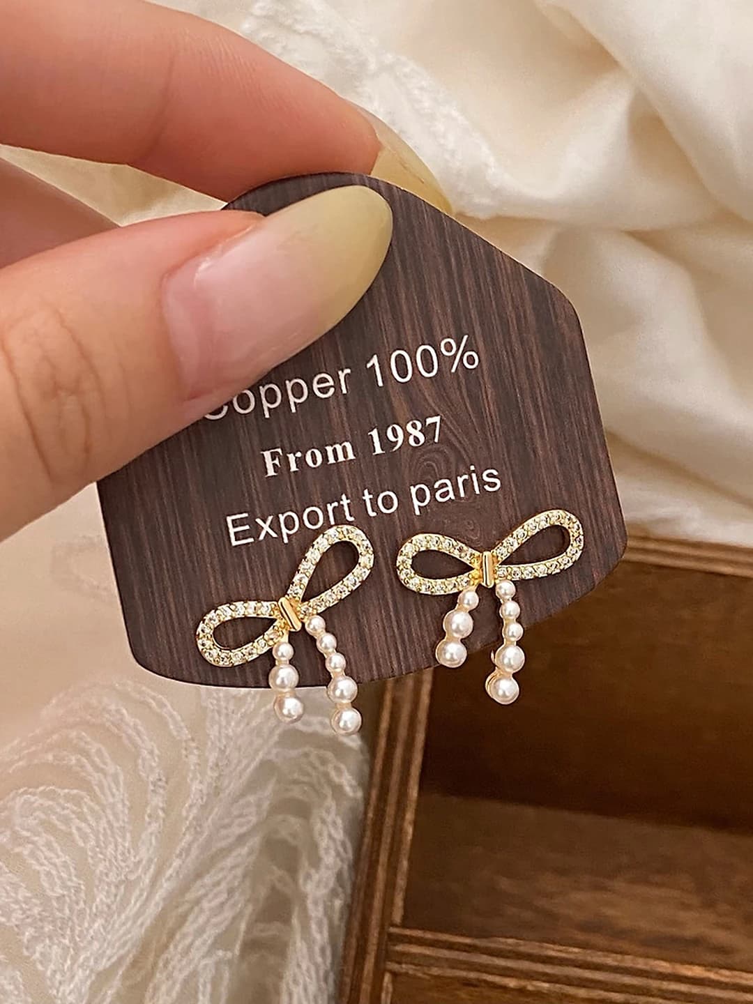 Gold bow stud earrings - gold plated