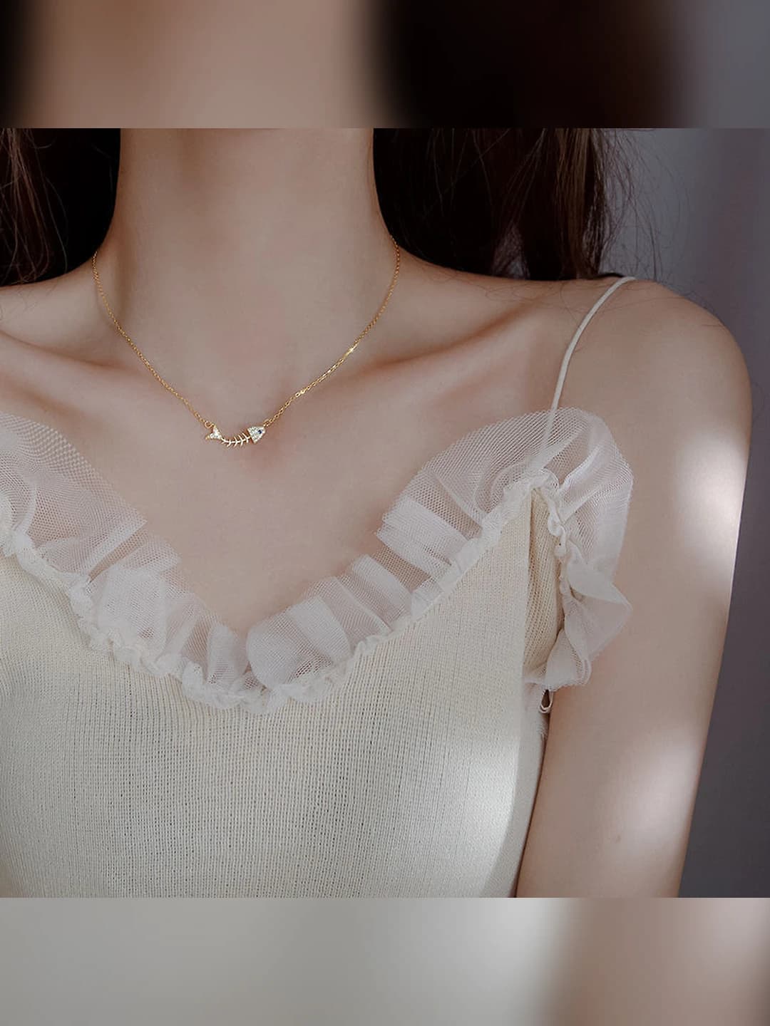 Gold fish bone necklace