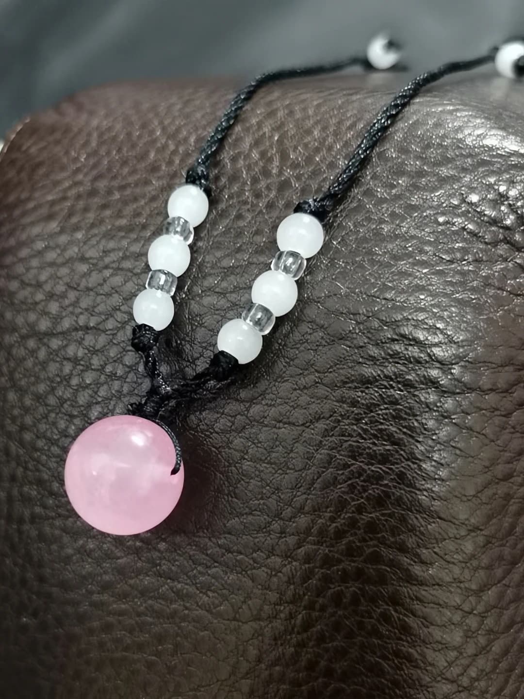 Black cord, pink agate