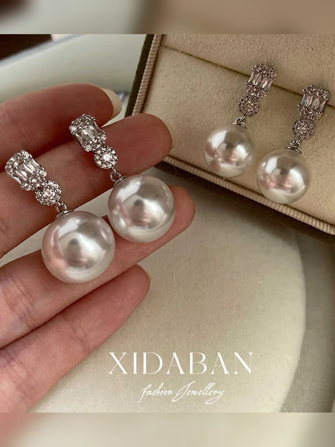 Women's pearl drop earrings with artificial white pearls and silver posts in Diana style