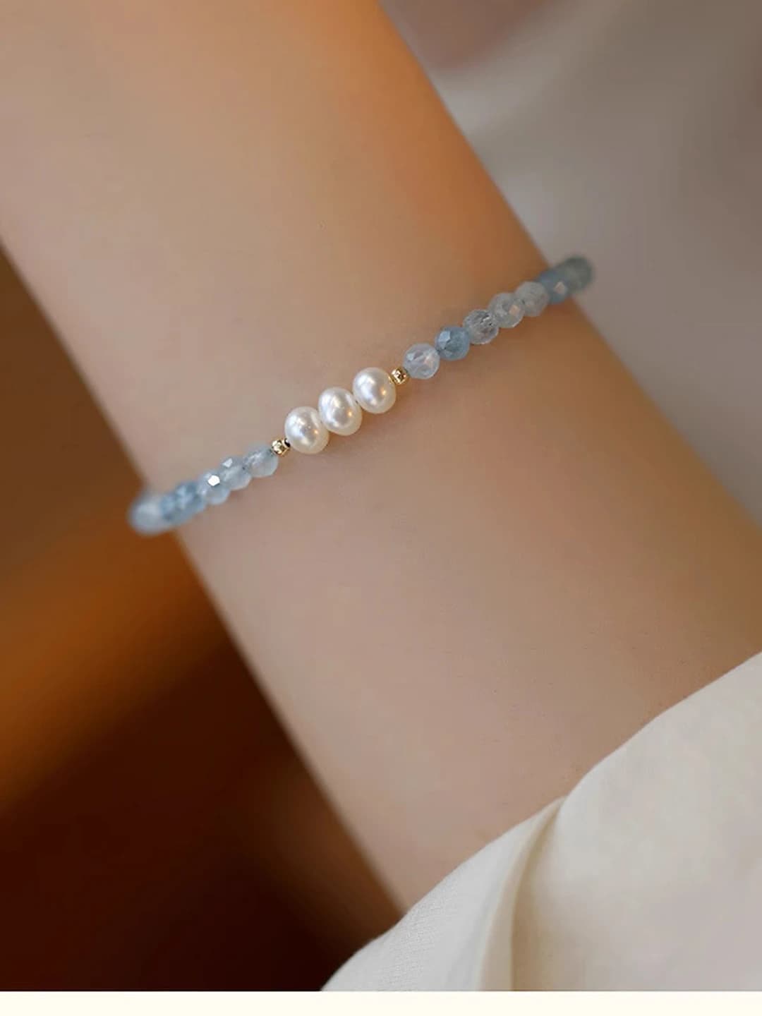 Faceted aquamarine pearl