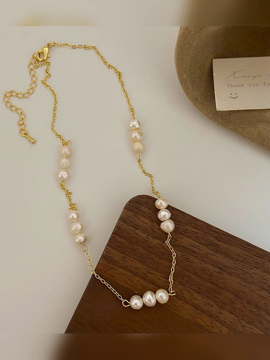 15 pearls, gold