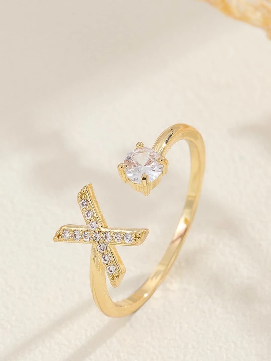 Gold letter X