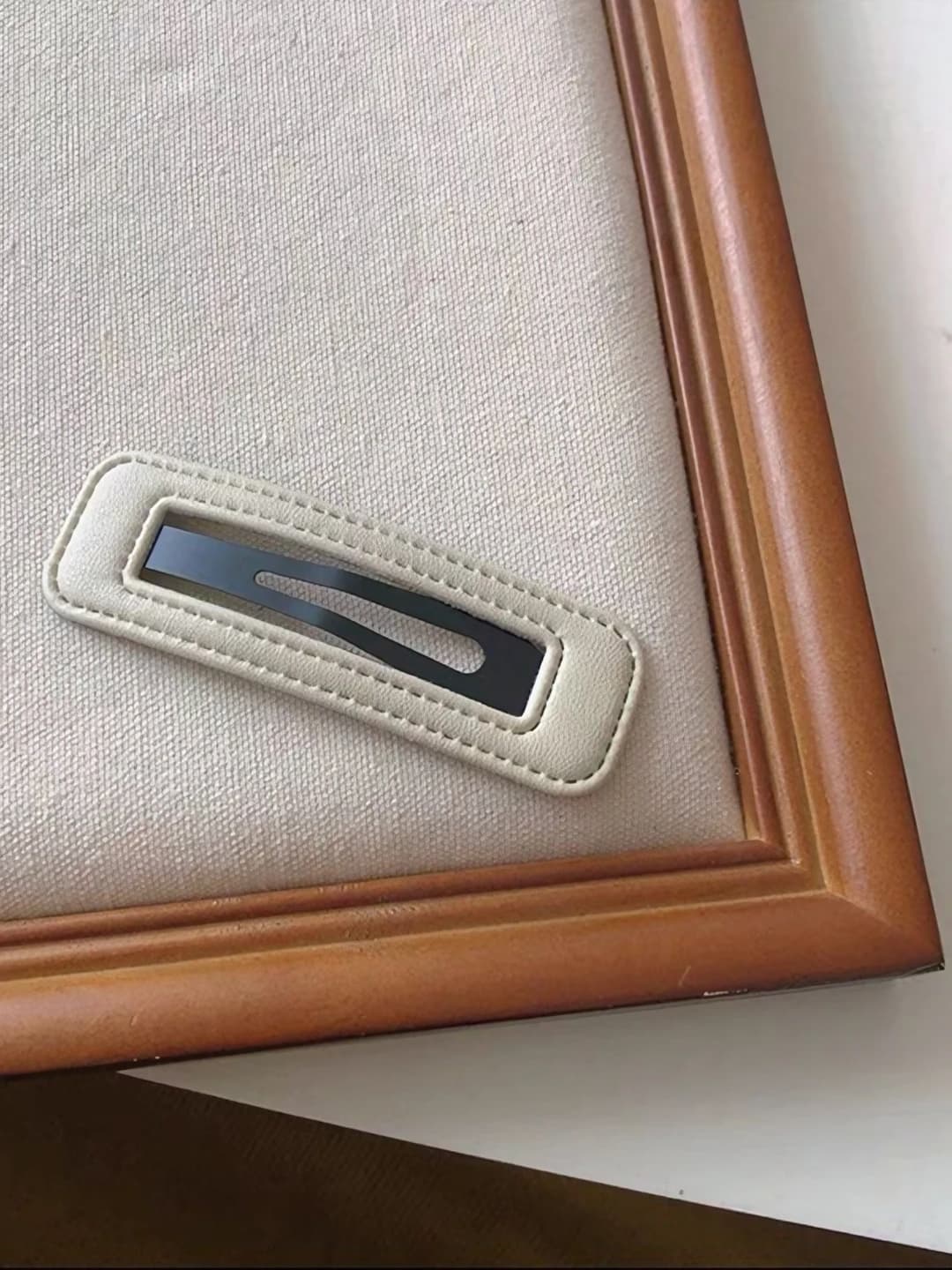 Beige flyaway hair clip
