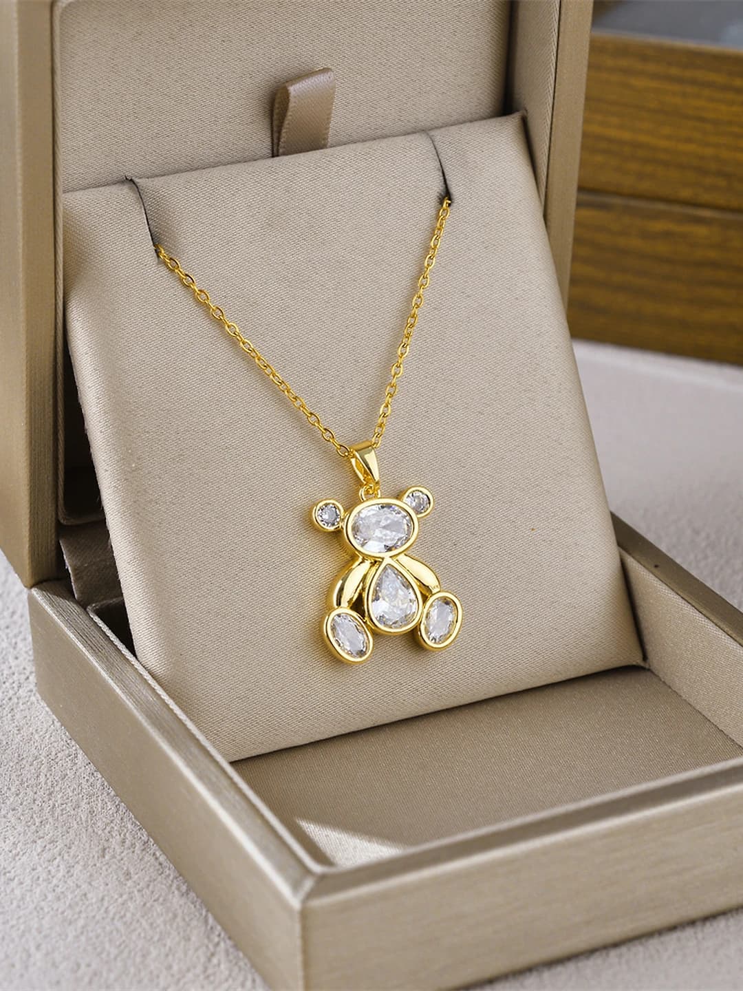 Gold bear, white