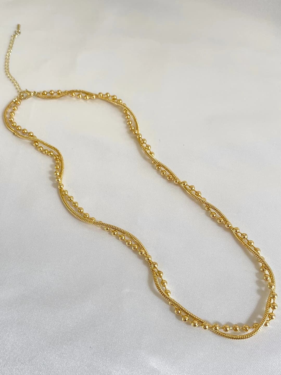Gold double layer twisted necklace
