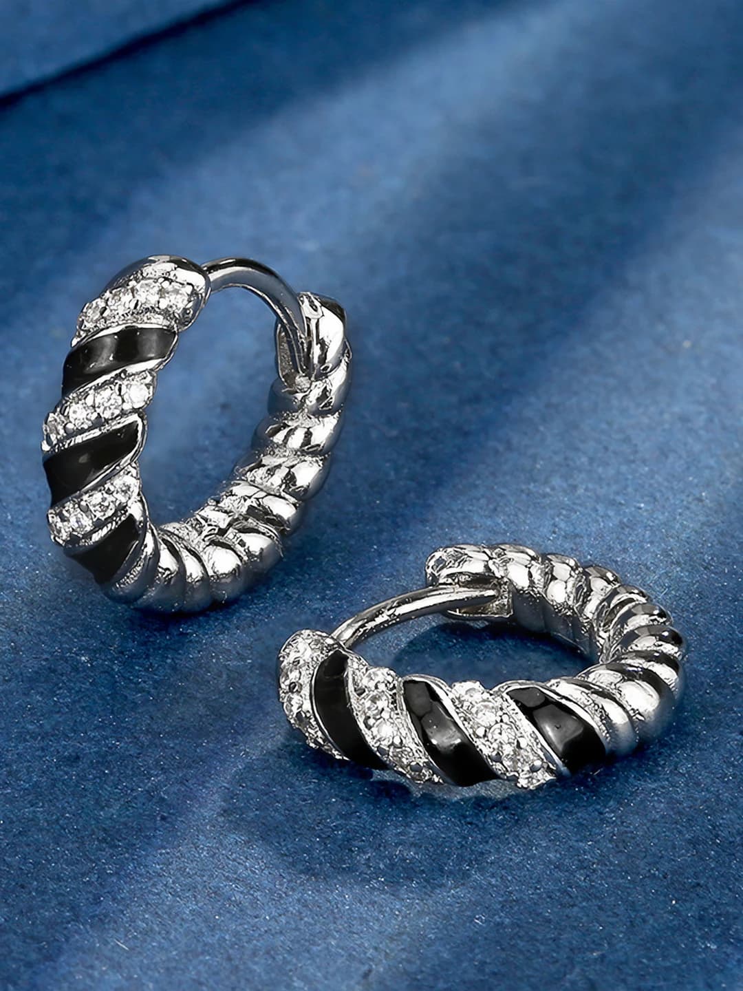 White gold stud earrings