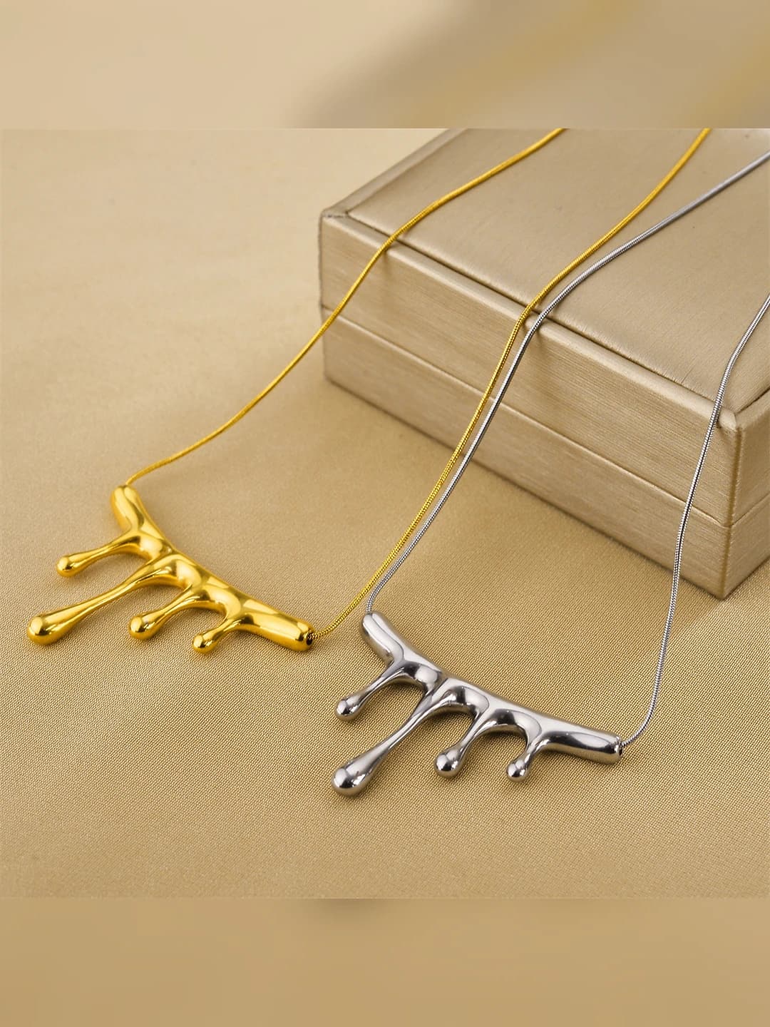 Women's titanium steel necklace with geometric flame pendant