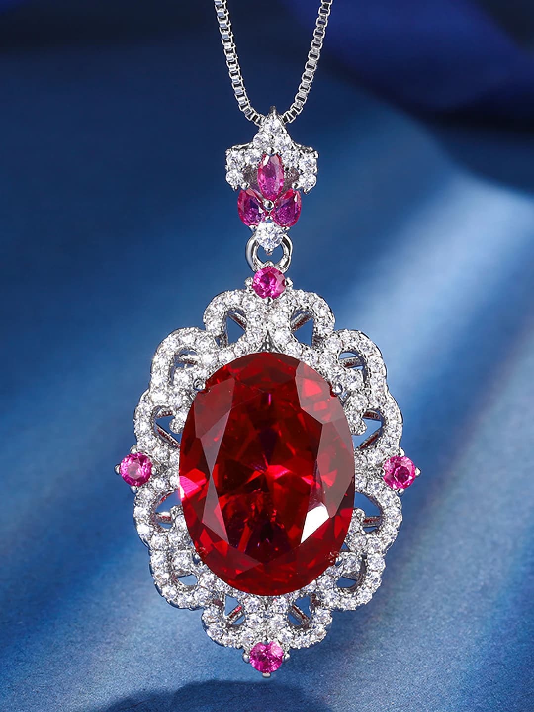 Red ruby pendant with chain
