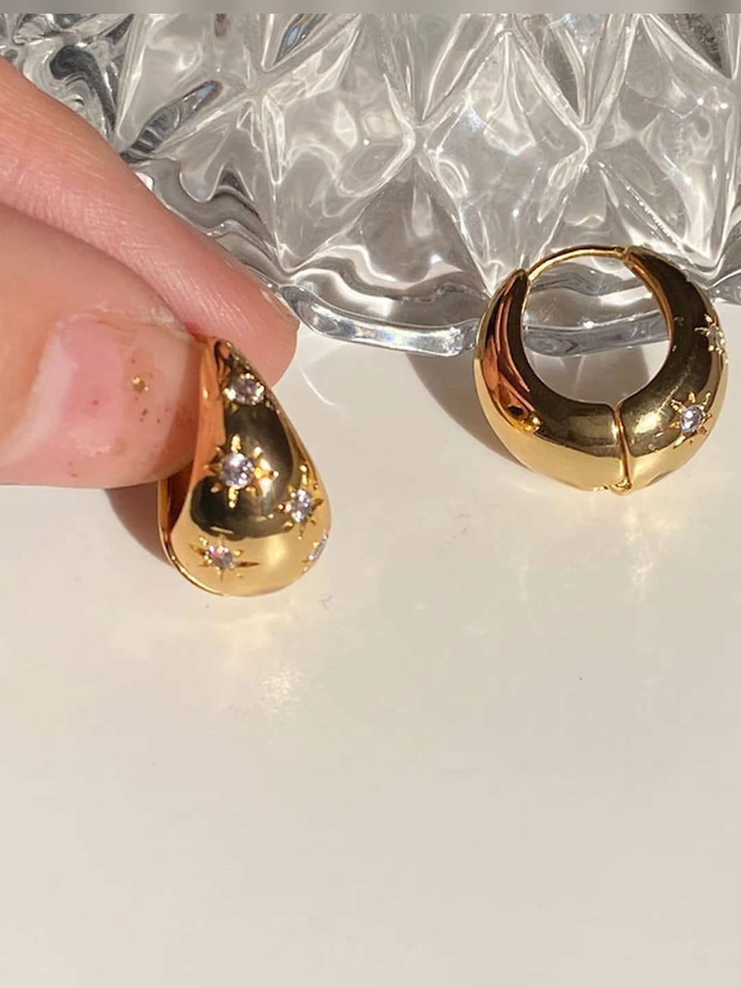 Women's geometric stud earrings with crystal inlay in a minimalist style