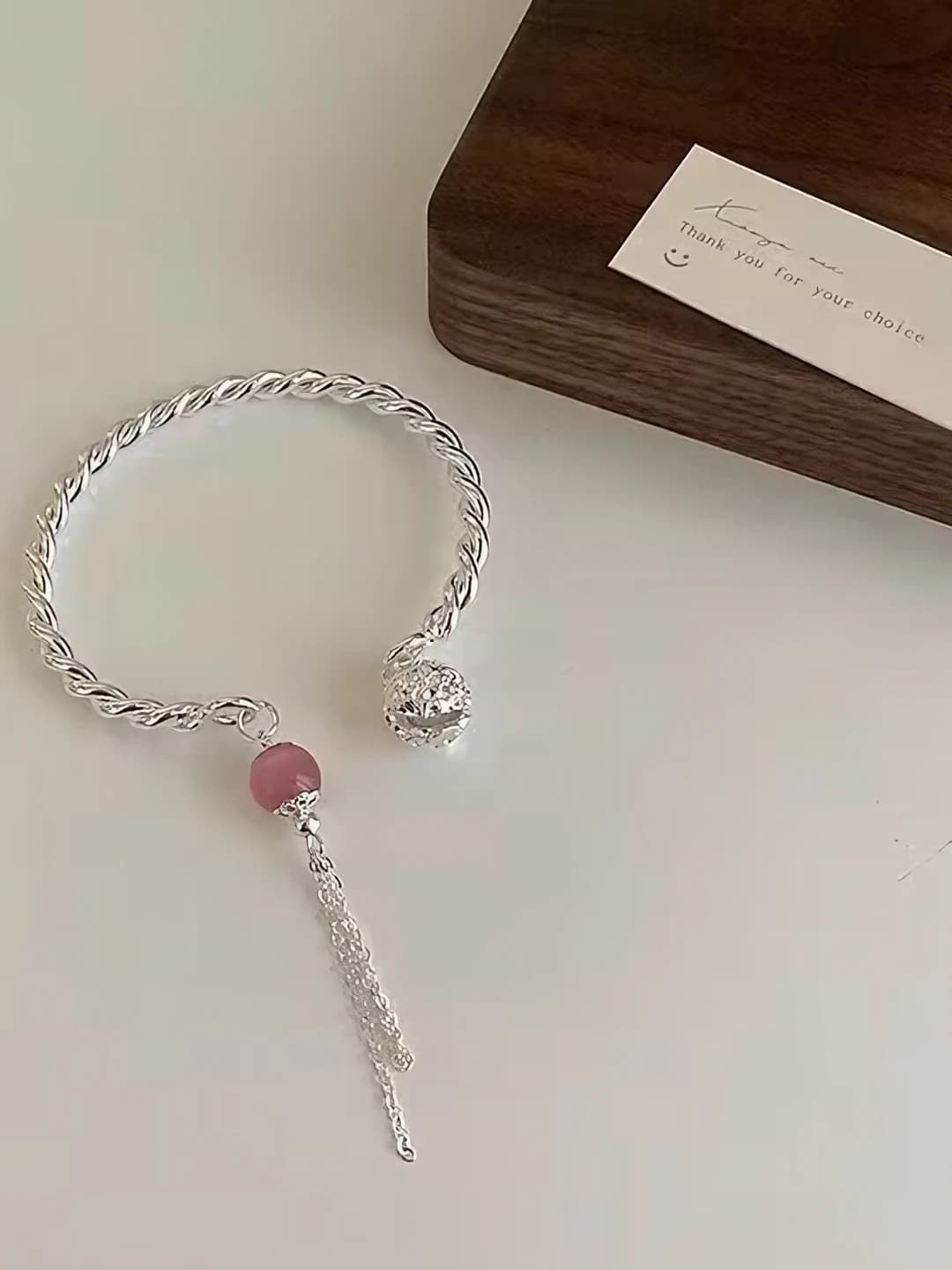 M348, pink tassel bracelet