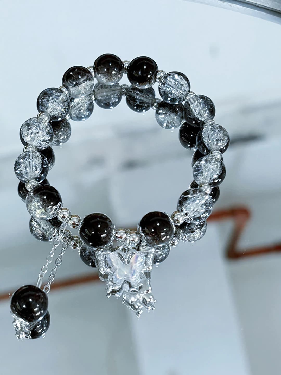 Black beaded butterfly bracelet