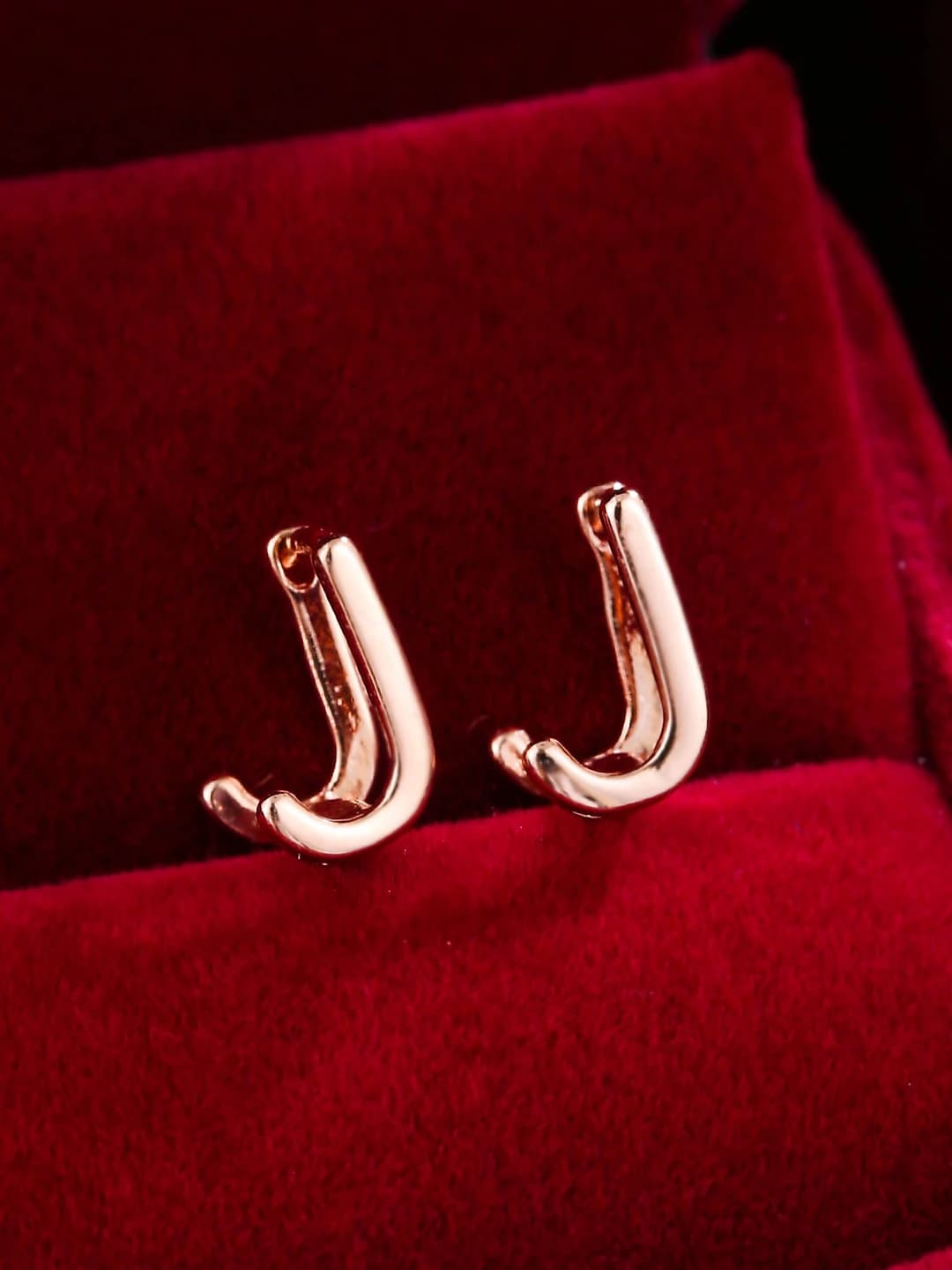 Розовое золото J