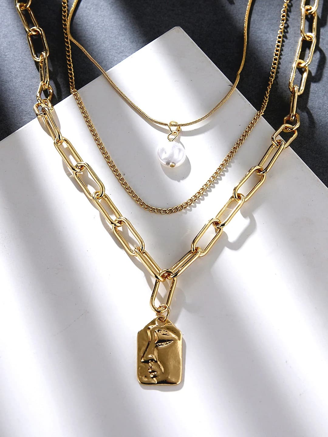 Women's retro multi-layer alloy necklace with geometric shape, pearl and embossed face pendant