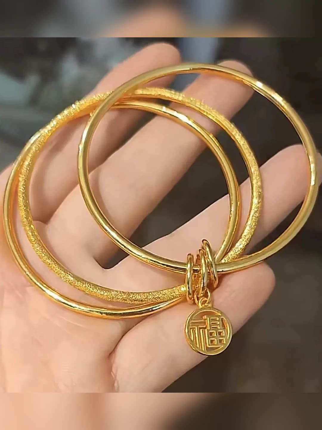 M610 [Gold Three Lives bangle]