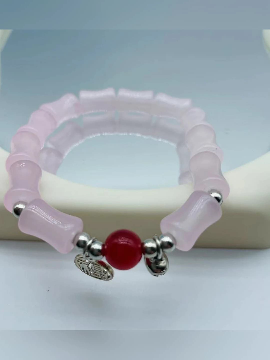 Black bamboo fu red bead bracelet