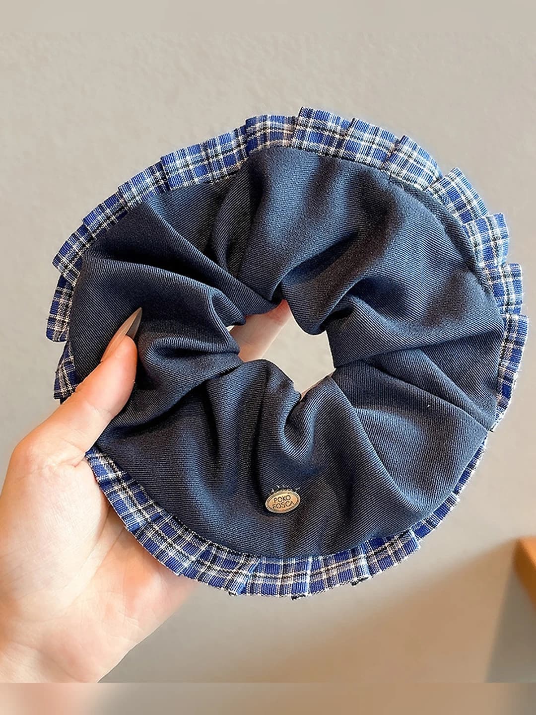 Blue scrunchie, plaid edge