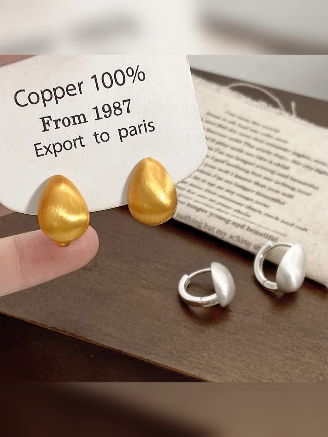 Women's gold matte brushed teardrop stud earrings