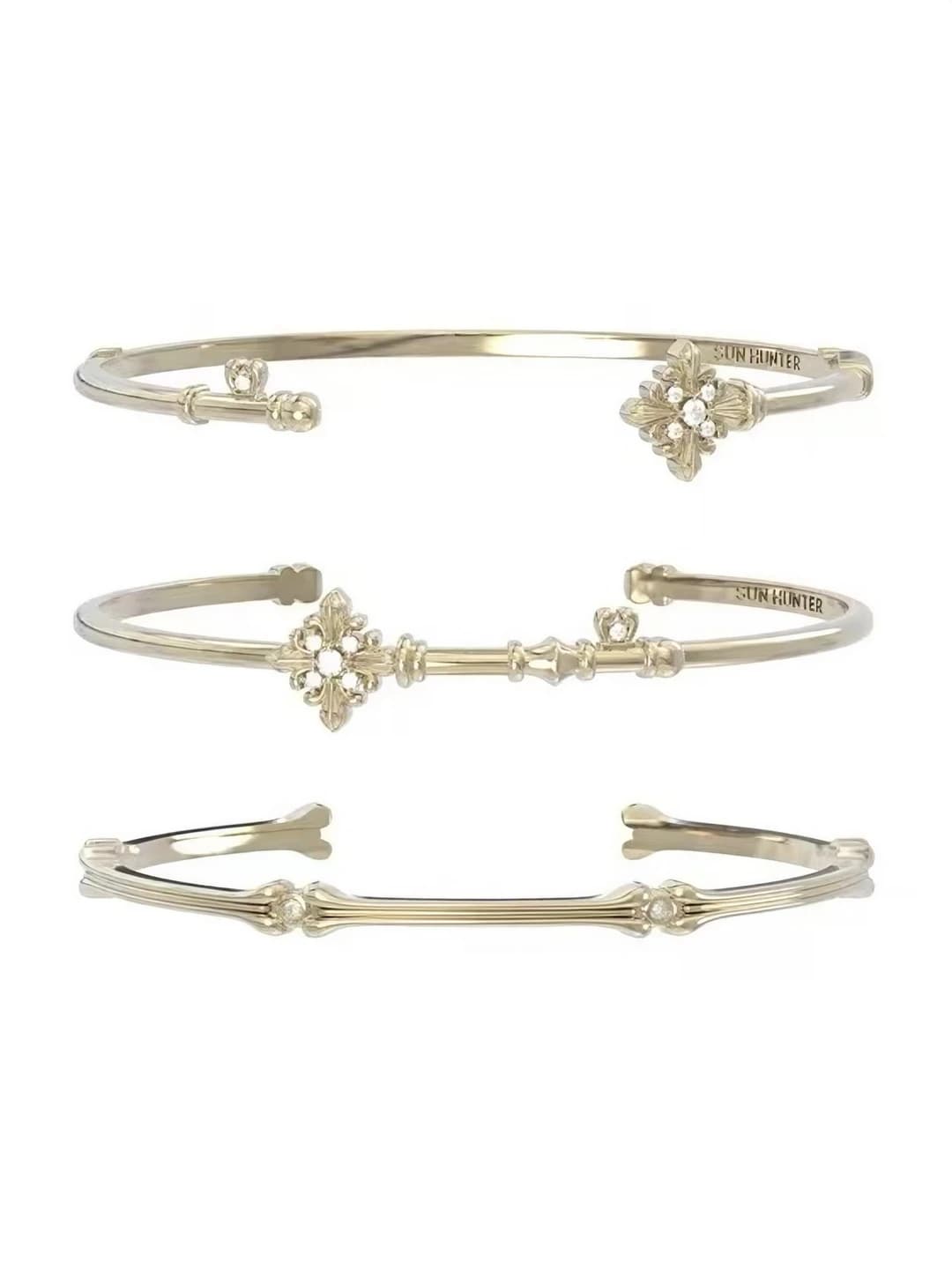 Women's retro style bracelet with iris design element, titanium gold color, adjustable open