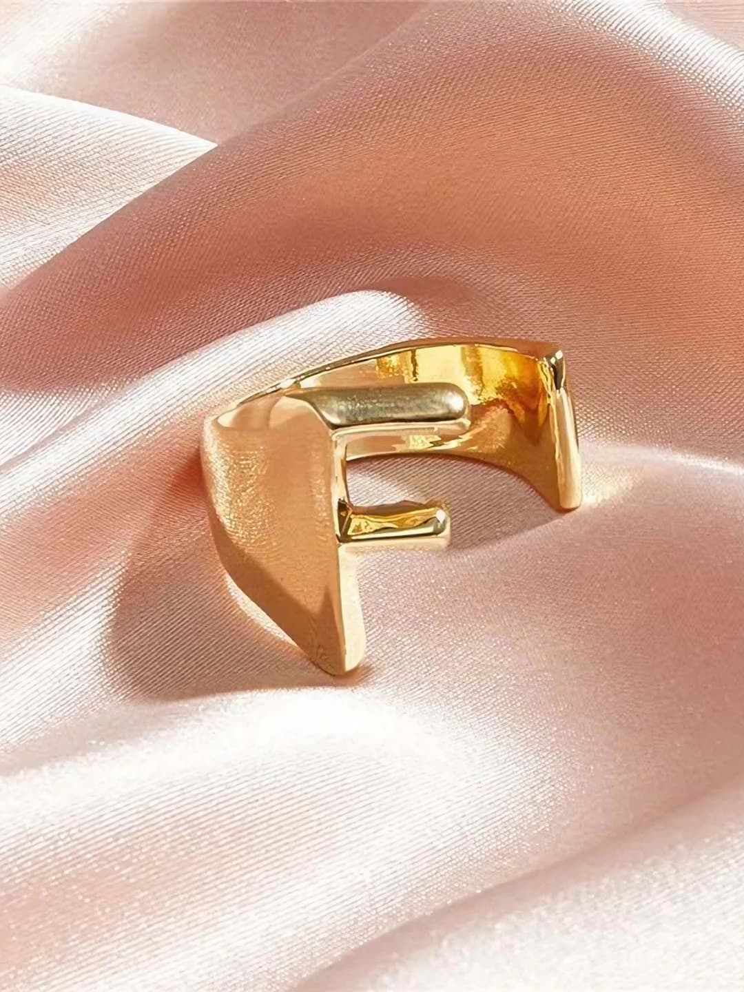 Золотой F
