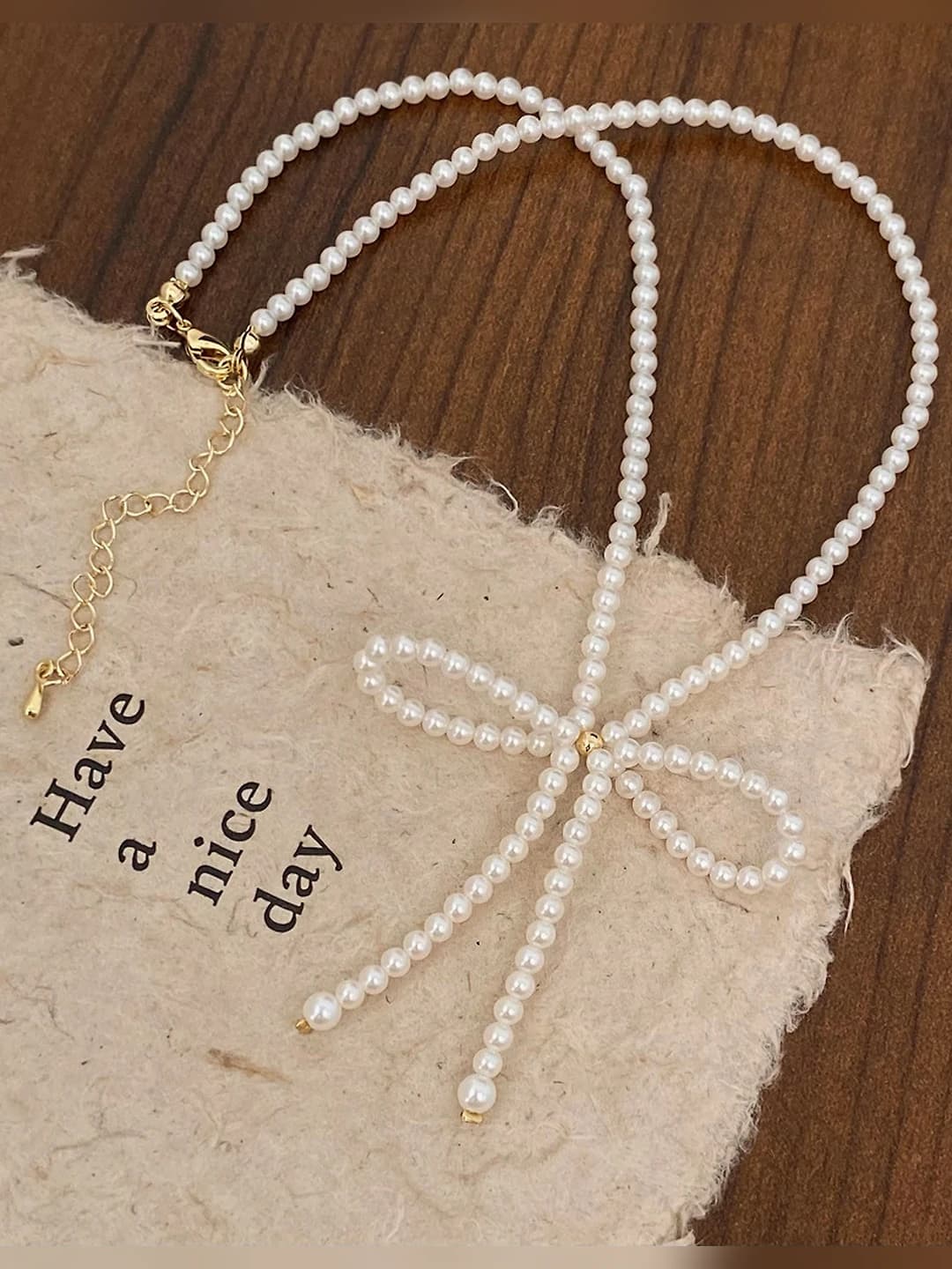 Swarovski pearl bow necklace B-26