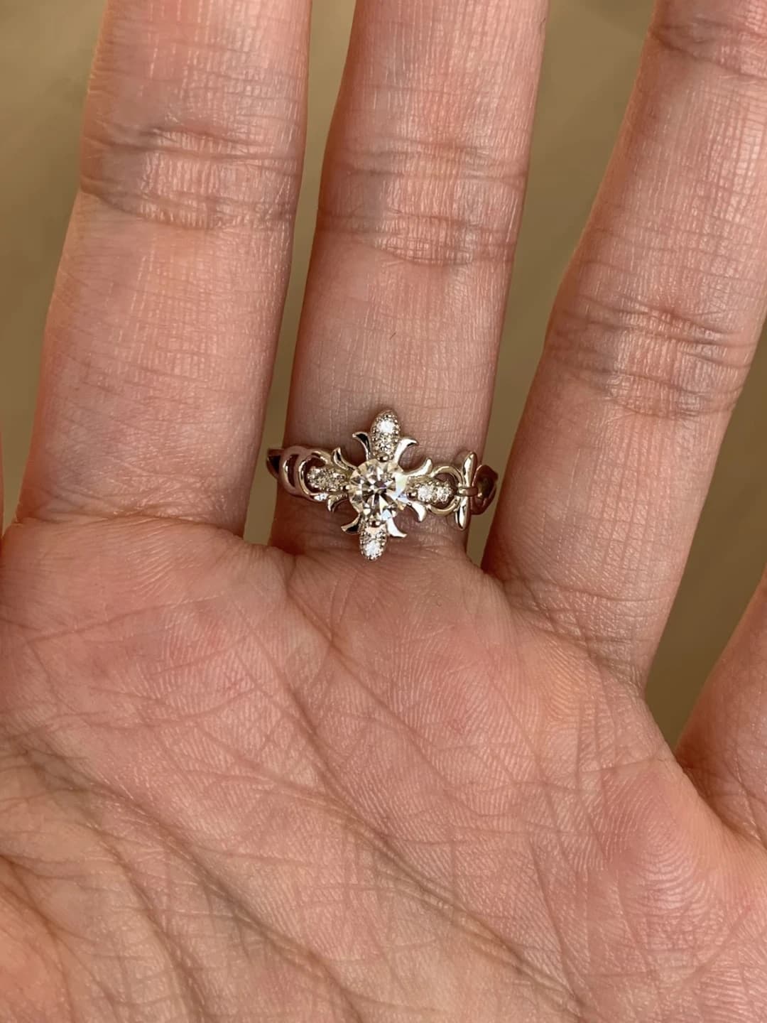Cross and iris ring