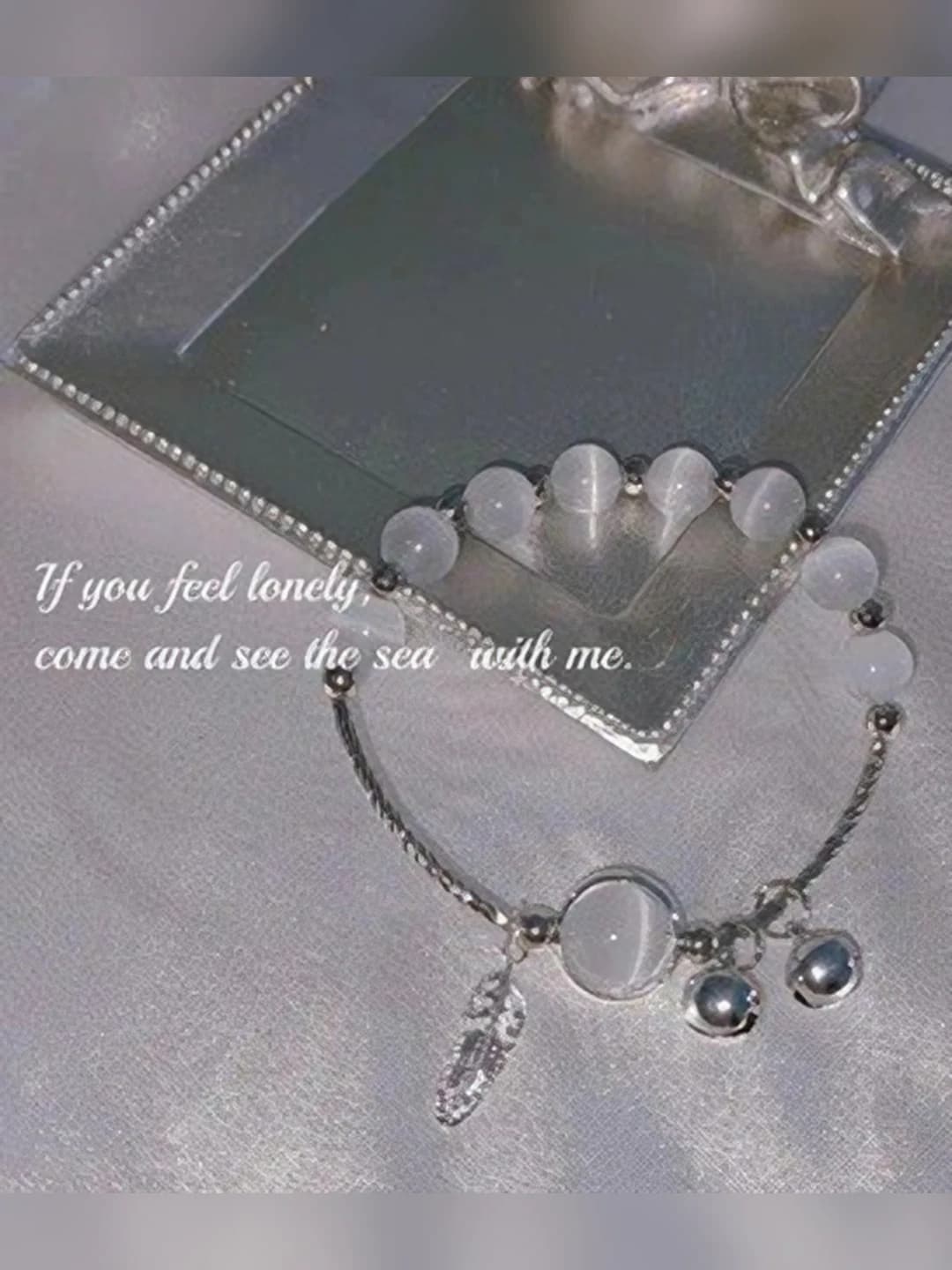 White 8 cat's eye + 1 cat's eye bracelet