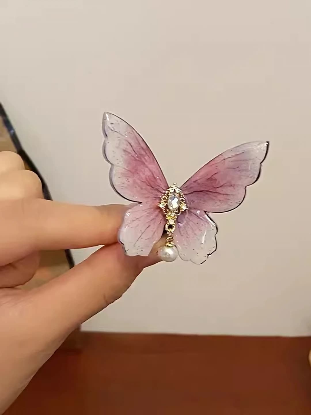 Sakura pink butterfly clip