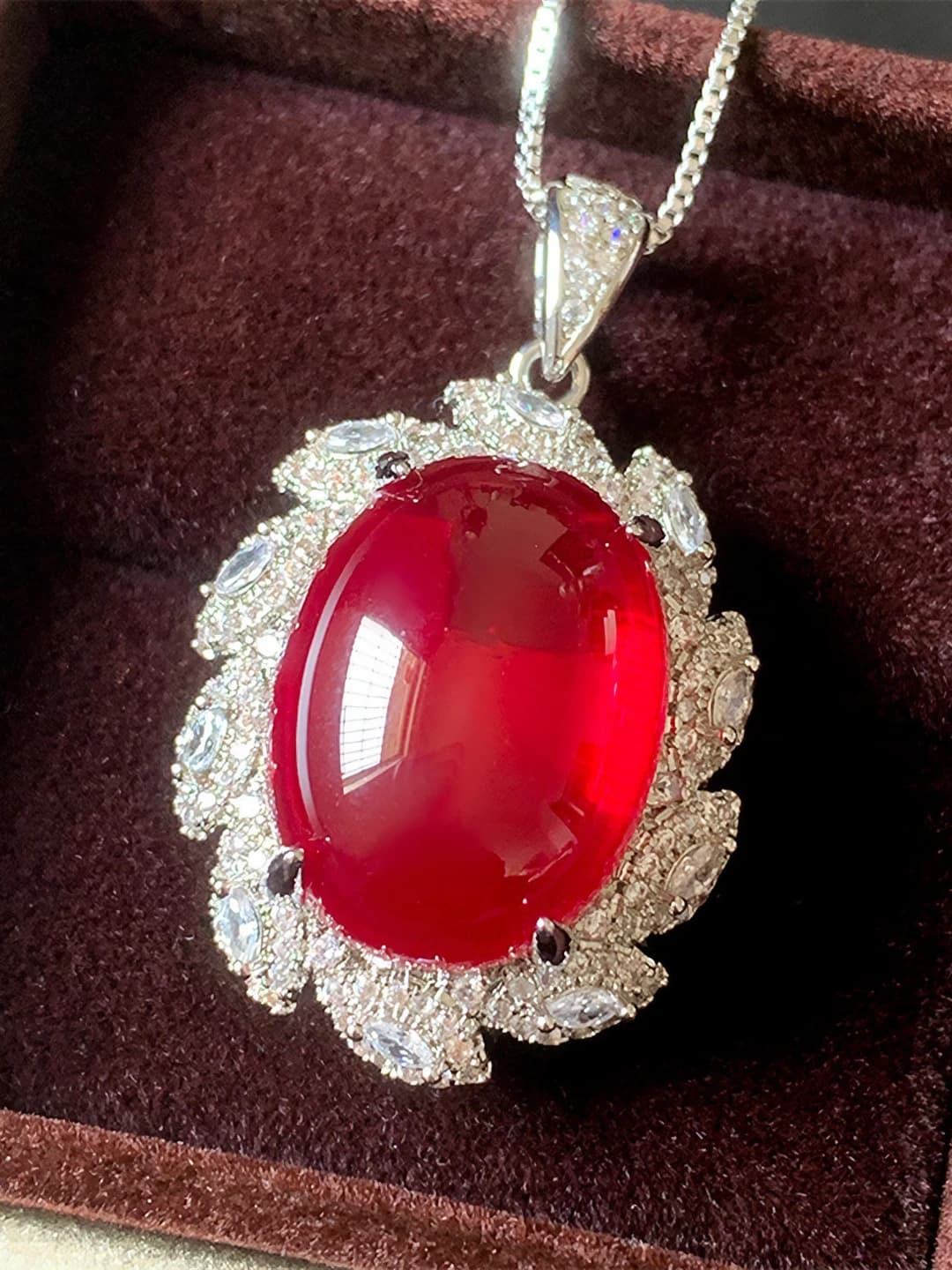 Red ruby pendant with chain